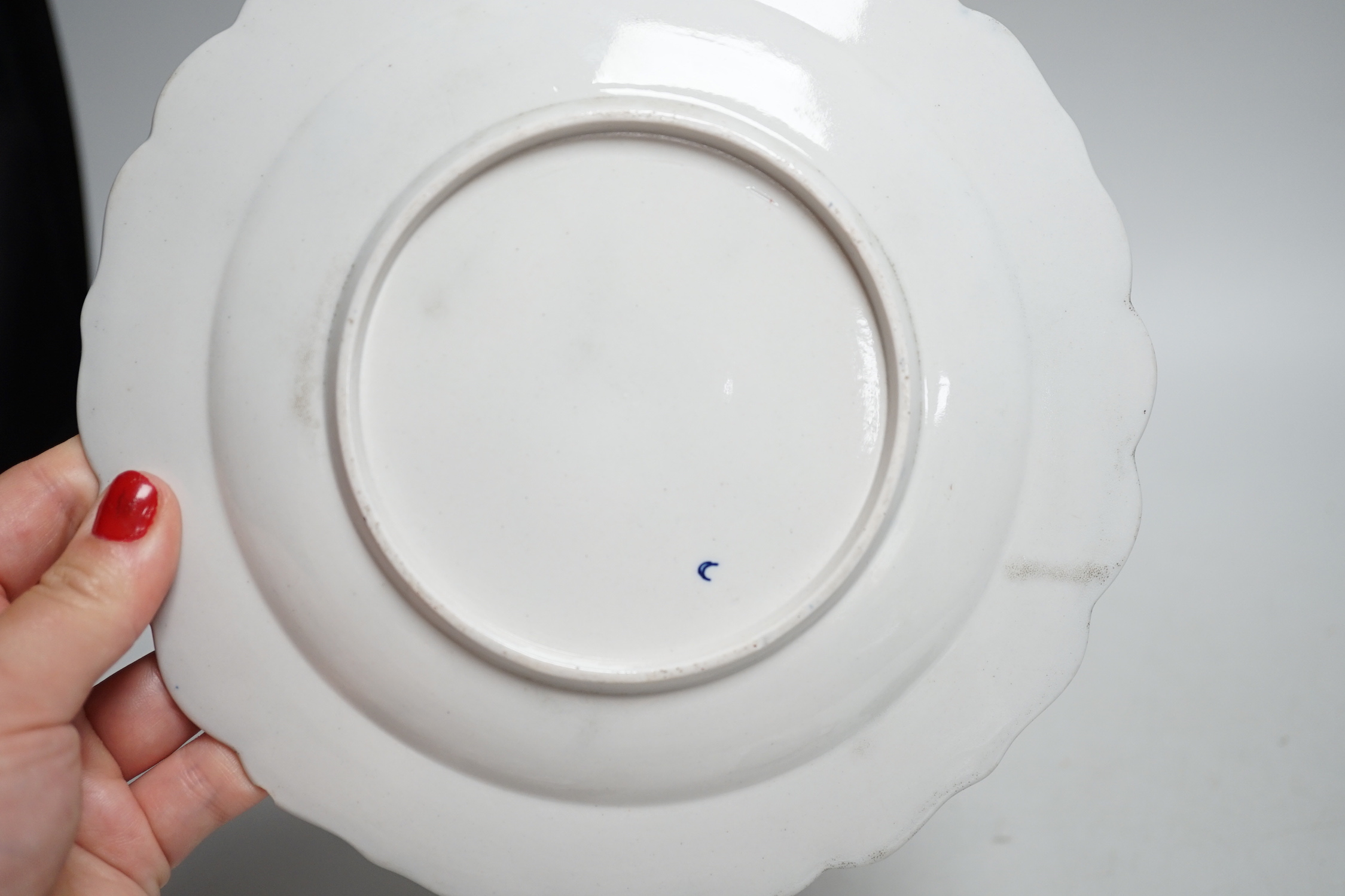 A Worcester kakiemon style scale blue trio, c.1770, a Worcester Queen Charlotte’s pattern plate, 19.5 cm and a Samson saucer in Worcester style